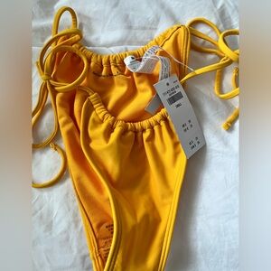 abercrombie & fitch 
yellow bikini bottom small
NEW WITH TAG